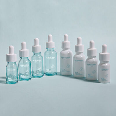 Ετικέτα Custom Round Serum Oil Bottle Ανθεκτικό σχεδιασμό για αιθέρια έλαια Προστασία του δέρματος και συσκευασία καλλυντικών