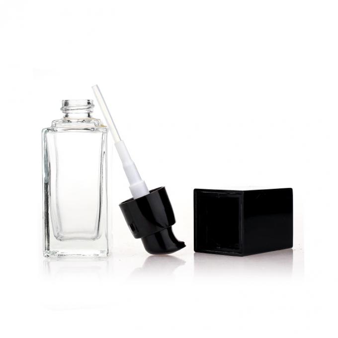 Το κενό μπουκάλι γυαλιού 35ml τετραγωνικό σαφές καλλυντικό πάγωσε το υγρό μπουκάλι γυαλιού αντλιών ιδρύματος Makeup