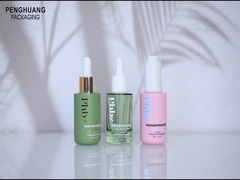 Τυπωμένα Dropper ορών γυαλιού 1oz φανταχτερά μπουκάλια για την καλλυντική συσκευασία